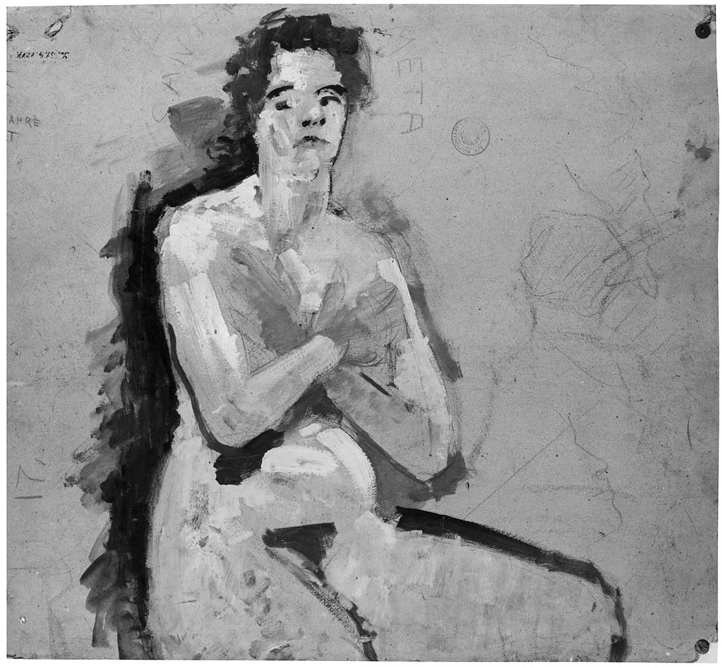 Donna seduta nuda
